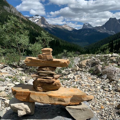 Symbol of balance, like stacked stones against a peaceful background.